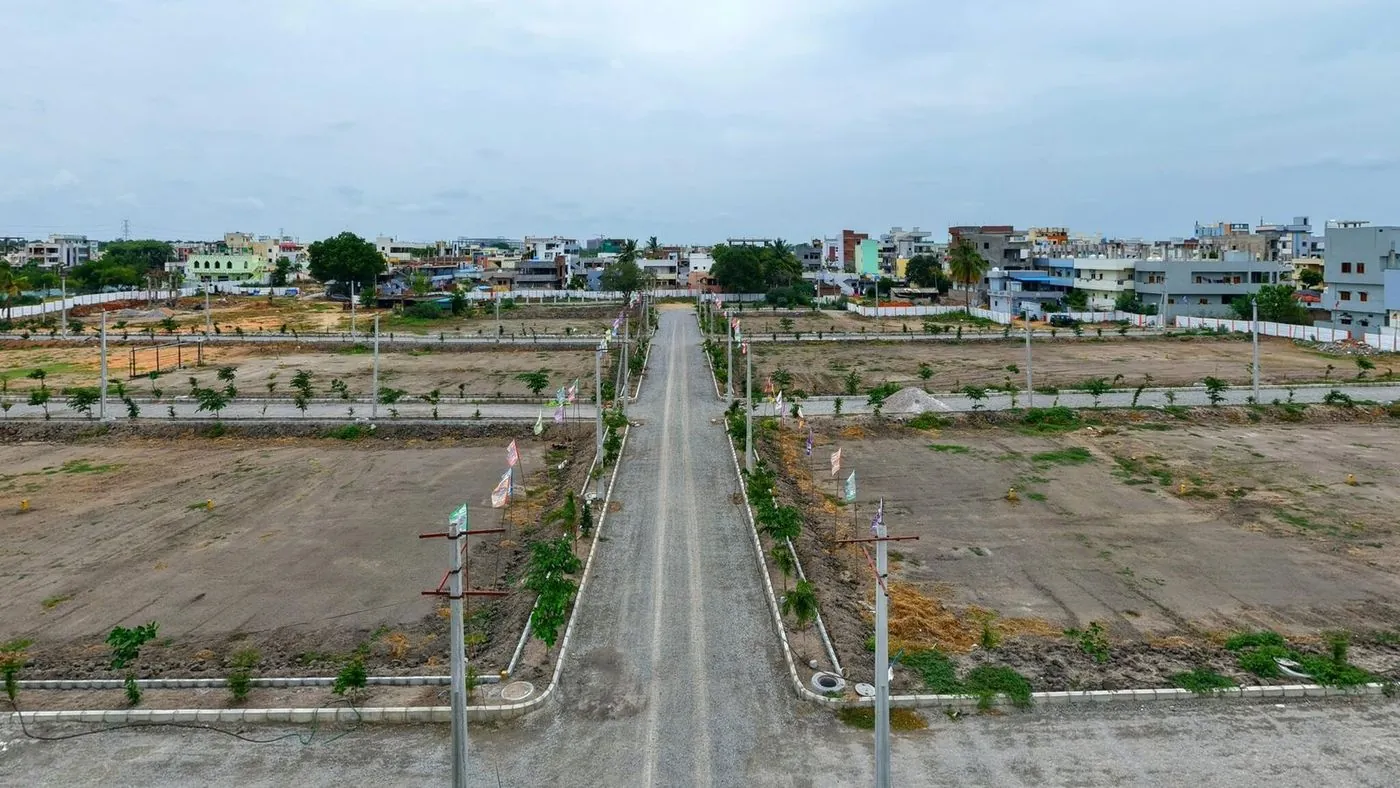 Cement concrete road running through the layout